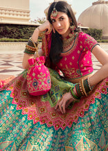 Load image into Gallery viewer, Green &amp; Pink Banarasi Silk Lehenga Choli with Heavy Embroidered work
