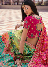 Load image into Gallery viewer, Green &amp; Pink Banarasi Silk Lehenga Choli with Heavy Embroidered work