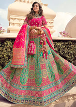 Load image into Gallery viewer, Pink &amp; Green Banarasi Silk Lehenga Choli with Heavy Embroidered work