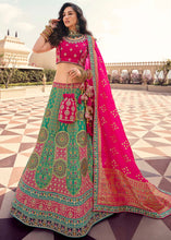 Load image into Gallery viewer, Pink &amp; Green Banarasi Silk Lehenga Choli with Heavy Embroidered work