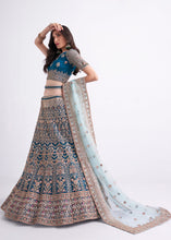Load image into Gallery viewer, Egyptian Blue Net Lehenga Choli with Cording,Thread,Sequins &amp; Zarkan work