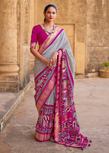 Load image into Gallery viewer, Magenta Purple Designer Patola Silk Saree with Zari Border &amp; Stone work