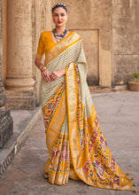 Load image into Gallery viewer, Saffron Yellow Designer Patola Silk Saree with Zari Border &amp; Stone work(Pre-Order)