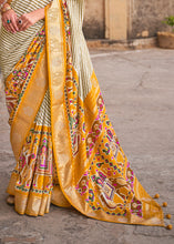Load image into Gallery viewer, Saffron Yellow Designer Patola Silk Saree with Zari Border &amp; Stone work(Pre-Order)