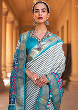 Load image into Gallery viewer, Cerulean Blue Designer Patola Silk Saree with Zari Border &amp; Stone work(Pre-Order)