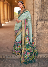 Load image into Gallery viewer, Dark Green Designer Patola Silk Saree with Zari Border &amp; Stone work(Pre-Order)