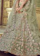 Laden Sie das Bild in den Galerie-Viewer, Olive Green Soft Net Lehenga Choli with Sequins, Thread, Zari &amp; Dori work