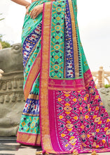 Load image into Gallery viewer, Blue &amp; Pink Patola Silk Saree with Zari Border &amp; Tassels On Pallu
