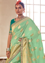 Load image into Gallery viewer, Pastel Green Woven Dola Silk Saree with Contrast Embroidered Border
