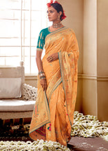 Load image into Gallery viewer, Light Orange Woven Dola Silk Saree with Contrast Embroidered Border