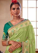 Load image into Gallery viewer, Light Green Woven Dola Silk Saree with Contrast Embroidered Border