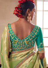 Load image into Gallery viewer, Light Green Woven Dola Silk Saree with Contrast Embroidered Border