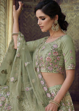 Laden Sie das Bild in den Galerie-Viewer, Olive Green Soft Net Lehenga Choli with Sequins, Thread, Zari &amp; Dori work