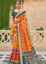 Cargar imagen en el visor de la galería, Yellow &amp; Green Patola Silk Saree with Zari Border &amp; Tassels On Pallu