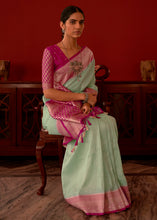 Load image into Gallery viewer, Pastel Green Zari Woven Georgette Saree with Contrast Border &amp; Blouse