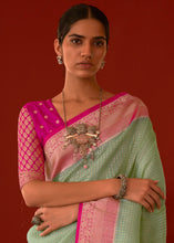 Load image into Gallery viewer, Pastel Green Zari Woven Georgette Saree with Contrast Border &amp; Blouse