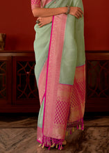 Load image into Gallery viewer, Pastel Green Zari Woven Georgette Saree with Contrast Border &amp; Blouse