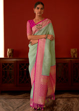 Load image into Gallery viewer, Pastel Green Zari Woven Georgette Saree with Contrast Border &amp; Blouse