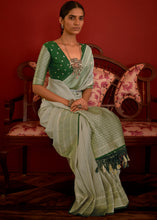 Load image into Gallery viewer, Shades Of Green Zari Woven Georgette Saree