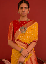 Load image into Gallery viewer, Saffron Yellow Zari Woven Georgette Saree with Contrast Border &amp; Blouse