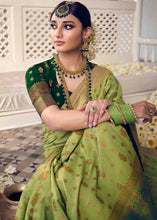 Load image into Gallery viewer, Pastel Green Floral Zari Woven Raw Silk Saree