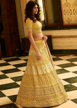 Load image into Gallery viewer, Royal Yellow Organza Lehenga Choli with Zari, Dori, Thread, Swarvoski &amp; Zarkan work