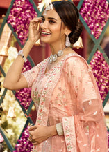 Load image into Gallery viewer, Pastel Peach Pink Crepe Lehenga Choli with Resham, Swarvoski, Zarkan &amp; Zari work