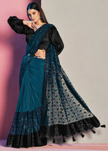 Load image into Gallery viewer, Capri Blue Net &amp; Lycra Saree with Resham Embroidery &amp; Sequins work