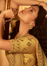 Laden Sie das Bild in den Galerie-Viewer, Royal Yellow Organza Lehenga Choli with Zari, Dori, Thread, Swarvoski &amp; Zarkan work