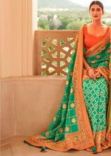 Load image into Gallery viewer, Jungle Green Patola Print Georgette Silk Saree