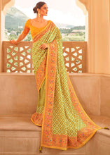 Load image into Gallery viewer, Avocado Green Patola Print Georgette Silk Saree