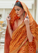 Load image into Gallery viewer, Peel Orange Handloom Patola Weave Silk Saree
