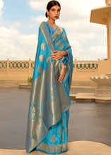 Laden Sie das Bild in den Galerie-Viewer, Cerulean Blue Woven Soft Kanjivaram Silk Saree with overall Butti work