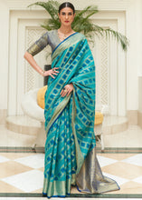 Load image into Gallery viewer, Shades Of Blue Zari Woven Patola Silk Saree
