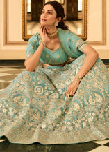 Load image into Gallery viewer, Turquoise Blue Organza Lehenga Choli with Zari, Dori, Resham, Gota &amp; Zarkan work