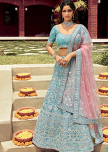 Laden Sie das Bild in den Galerie-Viewer, Picton Blue Organza Lehenga Choli with Dori, Zarkan &amp; Gota work