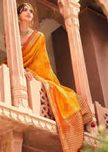 Load image into Gallery viewer, Saffron Yellow Woven Banarasi Silk Saree with Embroidered Blouse