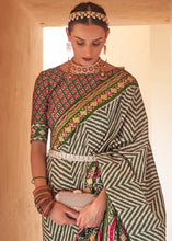 Load image into Gallery viewer, Shades Of Green Printed Patola Silk Saree with Zari Border &amp; Tassels on Pallu