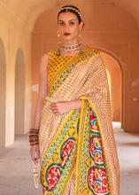 Load image into Gallery viewer, Golden Yellow Printed Patola Silk Saree with Zari Border &amp; Tassels on Pallu