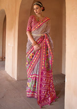 Load image into Gallery viewer, Brown &amp; Pink Printed Patola Silk Saree with Zari Border &amp; Tassels on Pallu