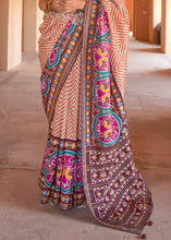 Load image into Gallery viewer, Shades Of Brown Printed Patola Silk Saree with Zari Border &amp; Tassels on Pallu