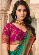 Load image into Gallery viewer, Pine Green Zari Butta Woven Raw Banarasi Silk Saree