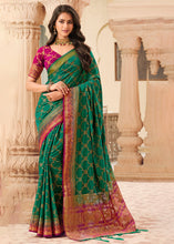 Load image into Gallery viewer, Pine Green Zari Butta Woven Raw Banarasi Silk Saree