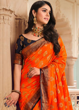 Load image into Gallery viewer, Tangelo Orange Zari Butta Woven Raw Banarasi Silk Saree