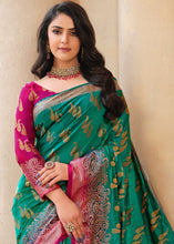 Load image into Gallery viewer, Dark Cyan Green Zari Butta Woven Raw Banarasi Silk Saree