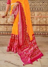 Load image into Gallery viewer, Saffron Yellow Patola Printed Soft Cotton Silk Saree with Zari Border