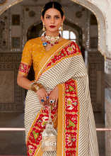 Load image into Gallery viewer, White &amp; Orange Patola Printed Soft Cotton Silk Saree with Zari Border