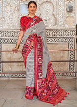 Load image into Gallery viewer, White &amp; Red Patola Printed Soft Cotton Silk Saree with Zari Border