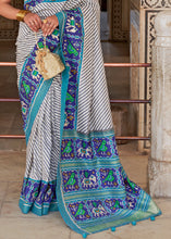 Load image into Gallery viewer, White &amp; Blue Patola Printed Soft Cotton Silk Saree with Zari Border