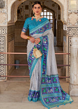 Load image into Gallery viewer, White &amp; Blue Patola Printed Soft Cotton Silk Saree with Zari Border